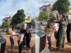 கணவருடன் கள்ளத்தொடர்பு; நடுரோட்டில் 23 வயது யுவதிக்கு சாணி ஊற்றி விளக்குமாறால் அடி! Video